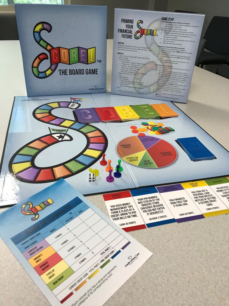 SCORE! board game box, game board, and playing pieces